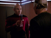 Durken and Picard drink wine