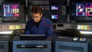 Malcolm Reed operates the tactical station on Enterprise NX-01