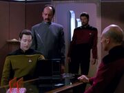 Data, Mendoza, Riker, and Picard discuss the Barzan wormhole