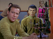 Kirk and Spock in briefing lounge playing chess