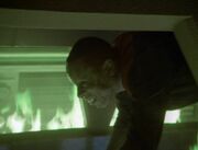 Benjamin Sisko in burning maintenance conduit