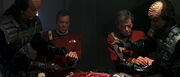 Kirk and McCoy are placed in Klingon handcuffs, 2293