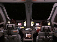 A forward view of a typical runabout cockpit ca. 2369