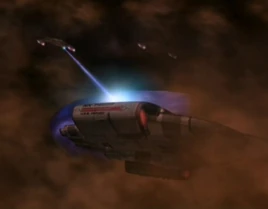 Jem'Hadar fighters attack the Defiant in gas giant
