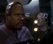 Benjamin Sisko and Elim Garak wearing the smaller version