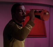 Evil Kirk drinking Saurian brandy