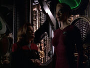 Janeway watches Seven regenerate