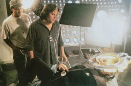 ...looking on, while Jim Rygiel (c) is preparing Matthew Dougherty's death, played by Anthony Zerbe in the chair.