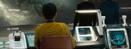 Hikaru Sulu operates the helm on the USS Enterprise in the alternate reality