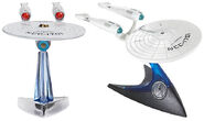 Hot Wheels USS Enterprise (alternate reality) prototype with incorrectly colored red bussard collectors next to Series 1 final production model