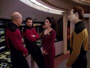 Picard, Riker, Troi, and Data discuss the Cardassians