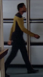 Enterprise-D male operations crewman in corridor, 2365