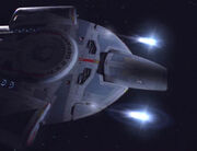 USS Defiant feuert Quantentorpedos