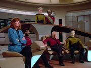 Bridge crew listening to Riker