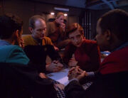 Bashir, Eddington, Odo, Kira, and Sisko