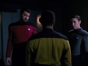 Riker breaking up a fight between La Forge and Crusher