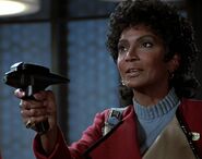 Uhura with phaser, 2285.jpg (286 KB) A type-2 with type-1 attached in 2285