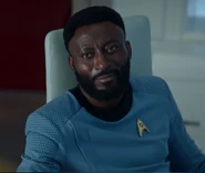 M'Benga, 2259.png (543 KB) Doctor Joseph M'Benga in a light blue medical uniform