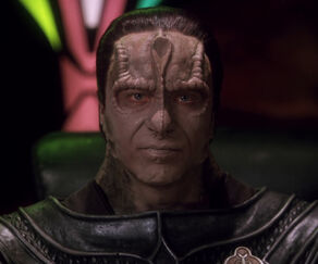 Legate Damar, a Cardassian male (2375)