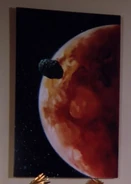 A painting of Mars and Deimos in a corridor on Relva VII/In a corridor at Starfleet Headquarters/In the guest quarters aboard the Enterprise-D (TNG: "Coming of Age", "Heart of Glory", "Symbiosis", "Conspiracy")