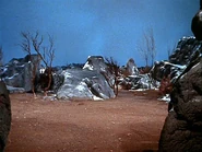 Sigma Draconis VI surface.jpg (37 KB) The original planet surface barely indicates the script's mention of an ice age...