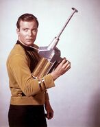 A contemporary publicity still featuring the phaser rifle…