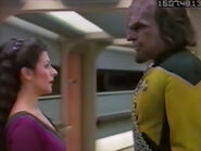 Troi and Worf in the corridor