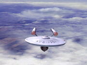 USS Enterprise over Earth