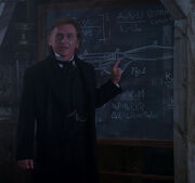 Moriarty with chalkboard