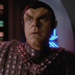 Quantum singularity alien as Romulan male