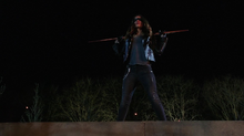 Dinah in her vigilante costume