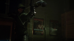 The Arrow aims a boxing glove arrow