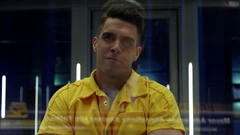 Adrian watches Oliver reveal Robert's suicide to the public