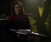 A compression phaser rifle