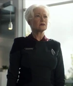   wearing the 2390s flag officer uniform as Starfleet commander in chief