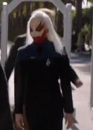 Commander Rhomsew in sciences blue