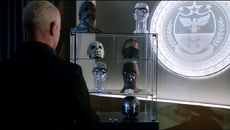 Damien Darhk with his trophies