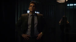 Adrian preparing to subject Oliver to torture