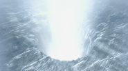 The energy beam burning a hole through the ice