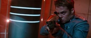  holding a 2250s-style phaser rifle in an alternate reality