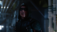 Malcolm Merlyn in the first Green Arrow suit