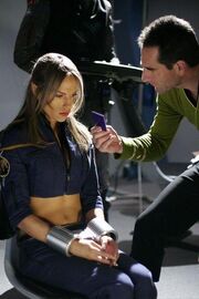 Interrogated by Archer in Defiant's briefing room