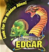 Package artwork from the Alien Attack Edgar figure.