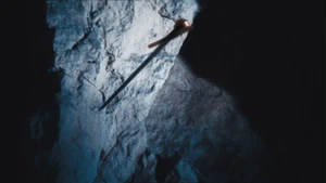 Merlin sends Arthur's sword against the Questing Beast.