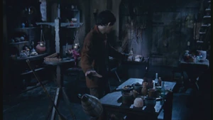 Merlin enchants several objects, stopping them.