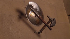 Edwin makes an ax fly against the young warlok.