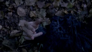 Morgana enchants her dagger with a gesture of her hand.
