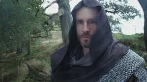 Tauren, former enemy of Camelot, wears chain mail