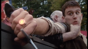 Gilli uses his ring to cast a stunning spell.