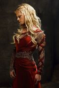 Morgause in red dress